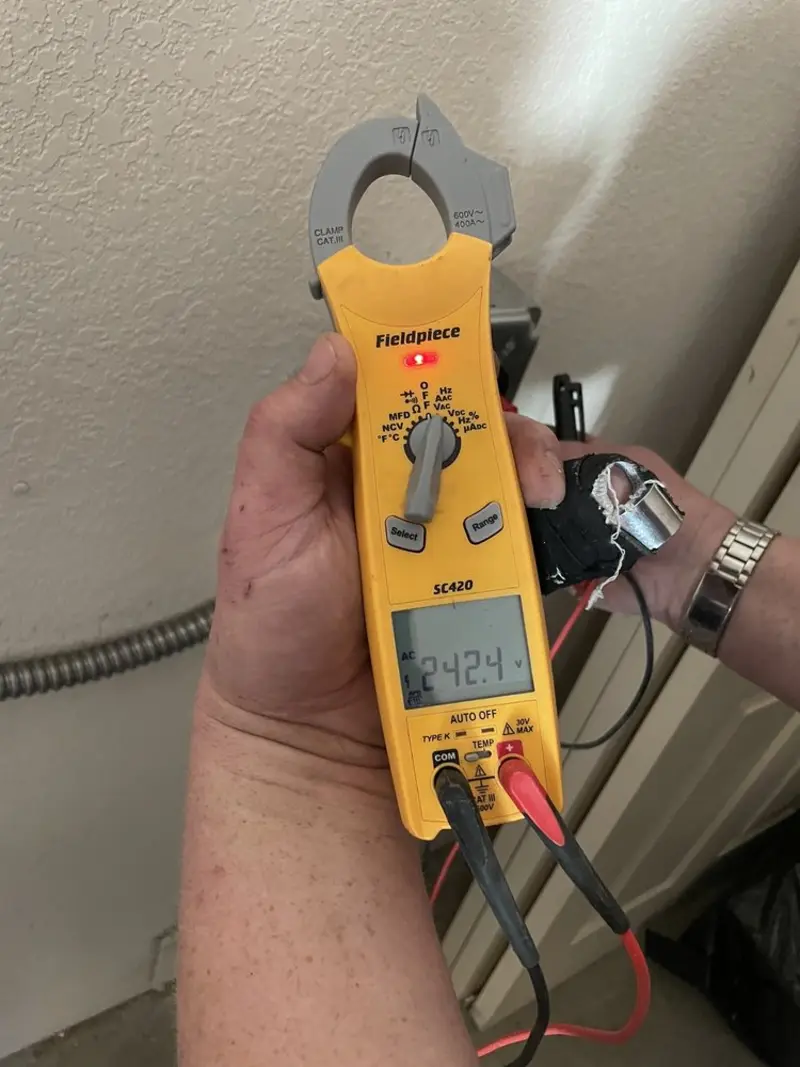 Voltage testing with clamp meter during Aluminum Wiring Replacement in Rossford